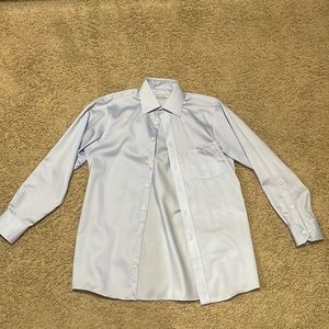 Blue dress shirt in good condition. I am selling because i do not wear it often.